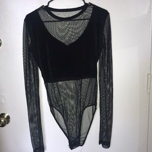 Velvet and fishnet bodysuit.